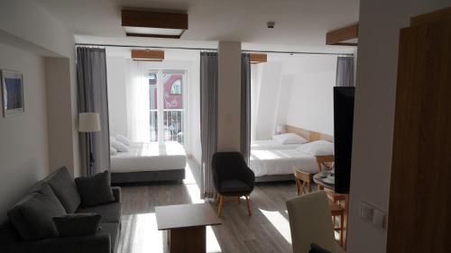 Imagen de la habitación del Hotel Apartament Aparthotel Passage. Foto 18