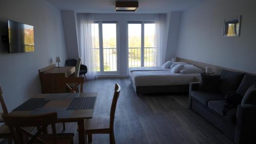 Imagen de la habitación del Hotel Apartament Aparthotel Passage. Foto 19
