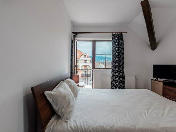 Imagen de la habitación del Hotel Apartament Simona Brasov. Foto 16