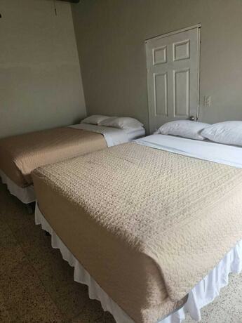 Imagen de la habitación del Hotel Apartamento APARTA HOTEL PALMEROLA. Foto 10