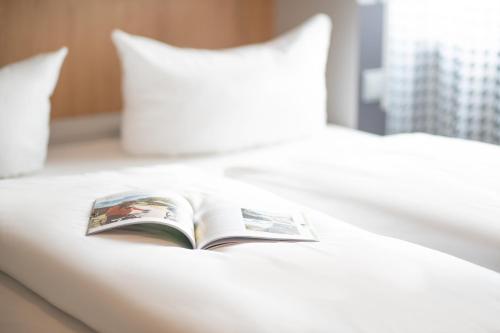 Imagen de la habitación del Hotel Apartamento Aparthotel Adagio Access Freiburg. Foto 17