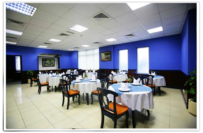 Imagen del bar/restaurante del Hotel Apartamento Desert Rose Hotel Apartments. Foto 3