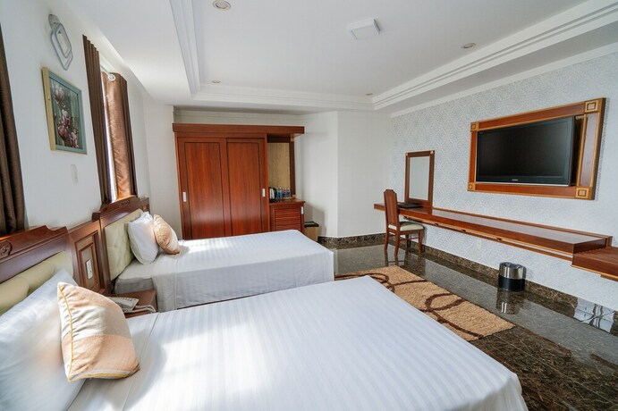 Imagen de la habitación del Hotel Apartamento Duc Long Gia Lai. Foto 21