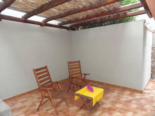 Imagen de la habitación del Hotel Apartamento Eco Village Baia delle Ginestre. Foto 3