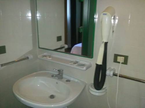 Imagen de la habitación del Hotel Apartamento Eco Village Baia delle Ginestre. Foto 5