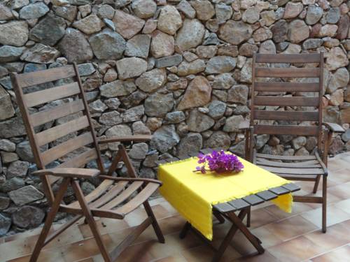 Imagen de la habitación del Hotel Apartamento Eco Village Baia delle Ginestre. Foto 13