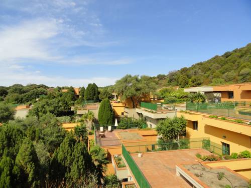 Imagen de la habitación del Hotel Apartamento Eco Village Baia delle Ginestre. Foto 16