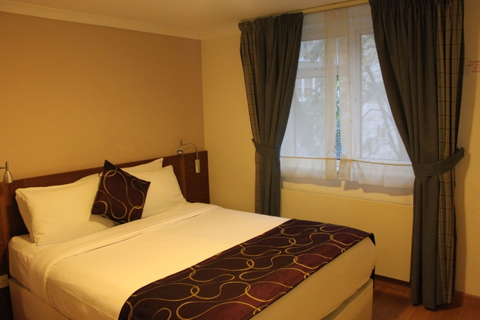 Imagen de la habitación del Hotel Apartamento Kensington. Foto 4