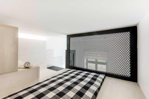 Imagen de la habitación del Hotel Apartamento Lofty Kampus Garnizon. Foto 12