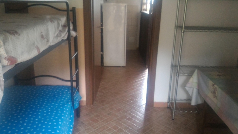 Imagen de la habitación del Hotel Apartamento Michelangelo House. Foto 10