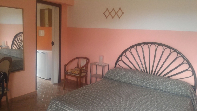 Imagen de la habitación del Hotel Apartamento Michelangelo House. Foto 14