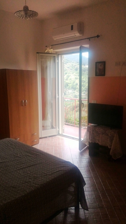 Imagen de la habitación del Hotel Apartamento Michelangelo House. Foto 16