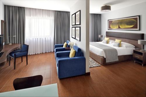Imagen de la habitación del Hotel Apartamento Movenpick Apartments Al Mamzar Dubai. Foto 14
