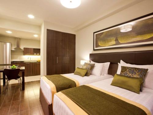 Imagen de la habitación del Hotel Apartamento Movenpick Apartments Al Mamzar Dubai. Foto 20