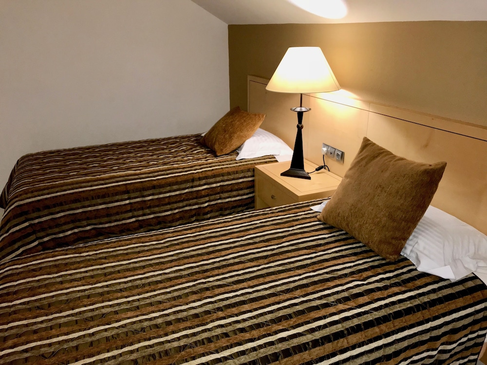 Imagen de la habitación del Hotel Apartamento Ona Hollywood Mirage. Foto 17