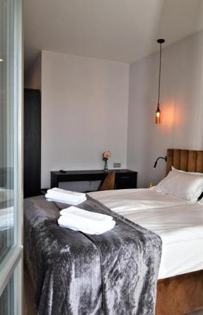 Imagen de la habitación del Hotel Apartamento Patio Riverfront. Foto 13