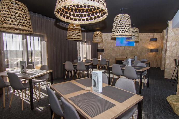 Imagen del bar/restaurante del Hotel Apartamento Pestana Gramacho Residences. Foto 2