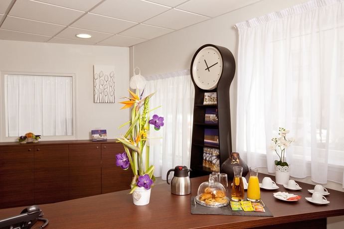 Imagen de los interiores del Hotel Apartamento Séjours and Affaires Massy Atlantis. Foto 15