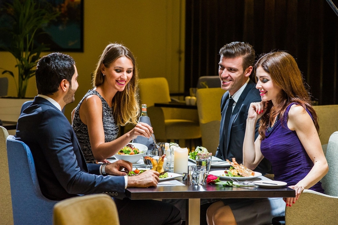 Imagen del bar/restaurante del Hotel Apartamento Somewhere Hotel Apartment. Foto 4