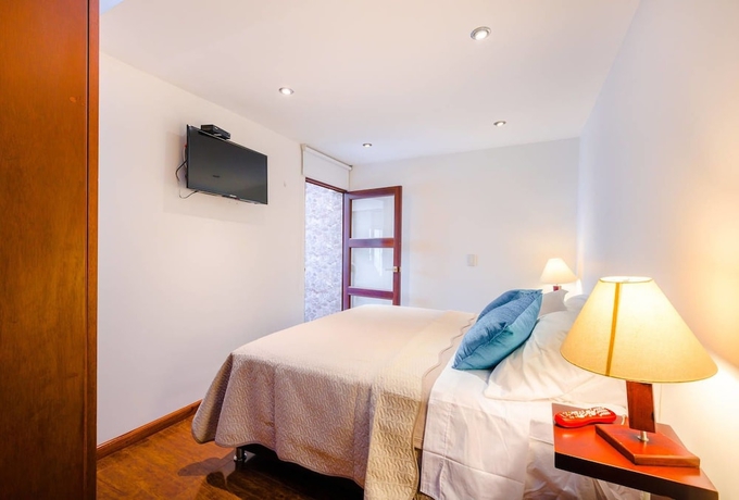 Imagen de la habitación del Hotel Apartamentos Aeropuerto Corferias. Foto 4