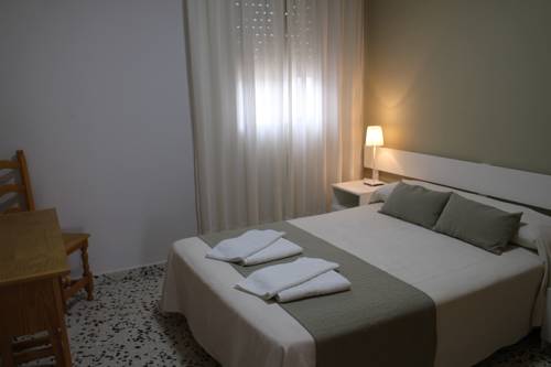 Imagen de la habitación del Hotel Apartamentos Bolonia Paraiso. Foto 7