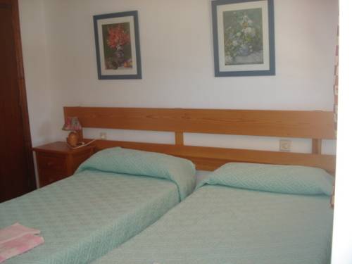 Imagen de la habitación del Hotel Apartamentos Bolonia Paraiso. Foto 12