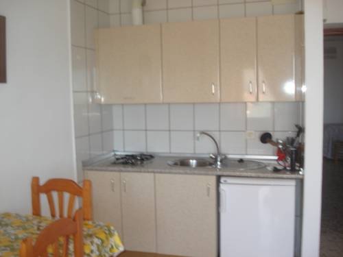 Imagen de la habitación del Hotel Apartamentos Bolonia Paraiso. Foto 14