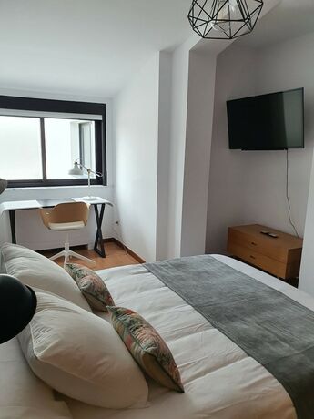 Imagen de la habitación del Hotel Apartamentos Ciudad Santiago. Foto 15