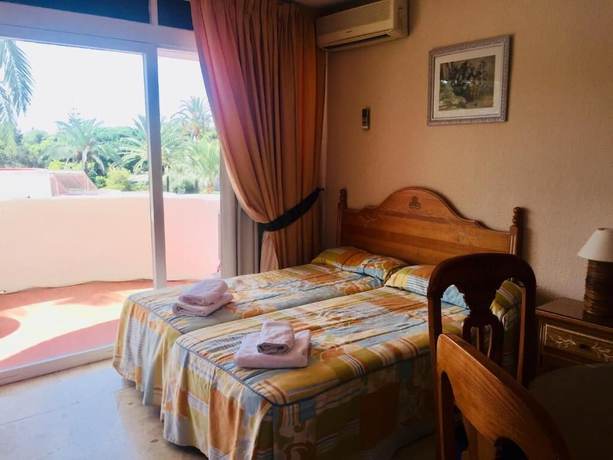 Imagen de la habitación del Hotel Apartamentos Coronado. Foto 18