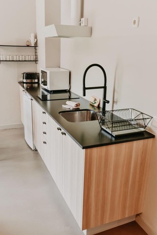 Imagen de la habitación del Hotel Apartamentos Dena. Foto 15