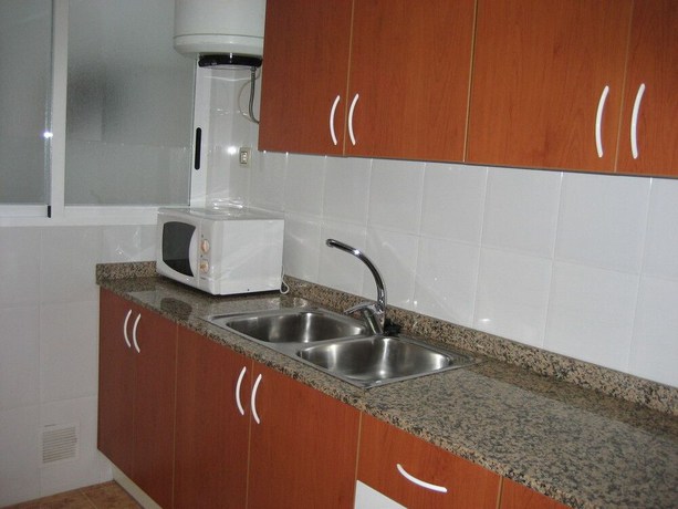 Imagen de la habitación del Hotel Apartamentos El Oasis. Foto 11