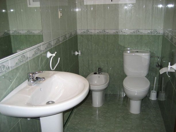Imagen de la habitación del Hotel Apartamentos El Oasis. Foto 15