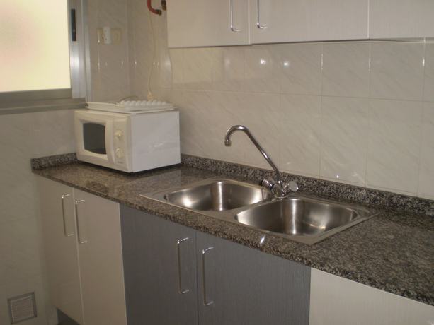 Imagen de la habitación del Hotel Apartamentos El Oasis. Foto 19