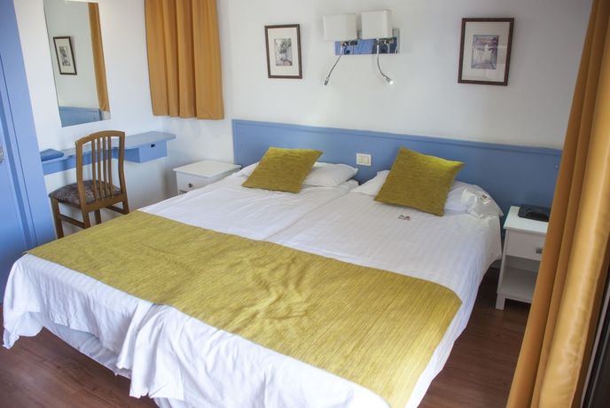 Imagen de la habitación del Hotel Apartamentos El Paseo. Foto 11