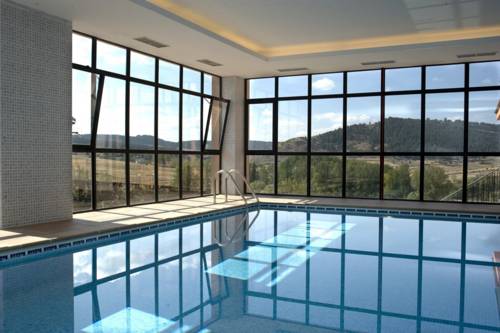 Imagen de la habitación del Hotel Apartamentos El Portón De La Sierra. Foto 3