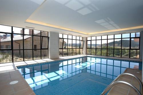 Imagen de la habitación del Hotel Apartamentos El Portón De La Sierra. Foto 4