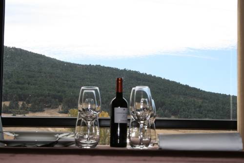 Imagen de la habitación del Hotel Apartamentos El Portón De La Sierra. Foto 10