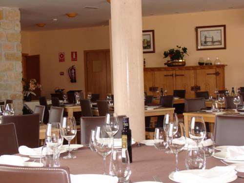 Imagen de la habitación del Hotel Apartamentos El Portón De La Sierra. Foto 12