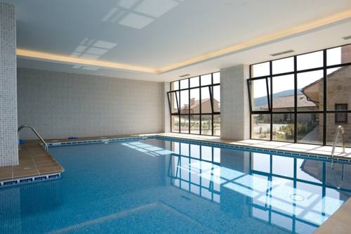 Imagen de la habitación del Hotel Apartamentos El Portón De La Sierra. Foto 16