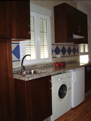 Imagen de la habitación del Hotel Apartamentos Embrujo De Azahar. Foto 16