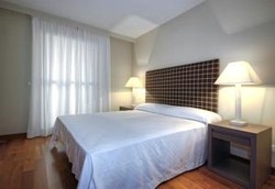 Imagen de la habitación del Hotel Apartamentos Fuencarral Luxury. Foto 2