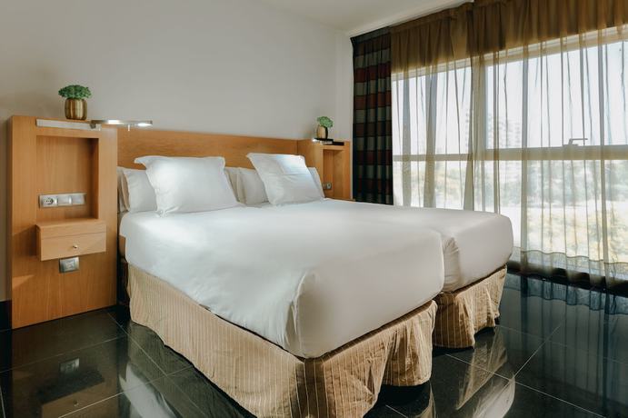 Imagen de la habitación del Hotel Apartamentos Hesperia Barcelona Fira. Foto 11