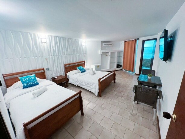 Imagen de la habitación del Hotel Apartamentos In Di Morgans Cannon. Foto 19