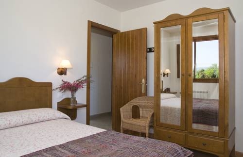 Imagen de la habitación del Hotel Apartamentos La Cruz De Paderne. Foto 7