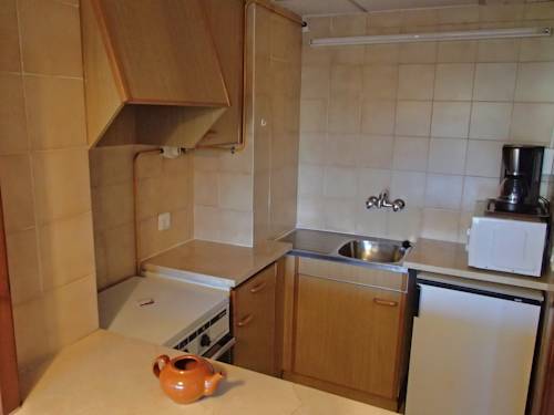 Imagen de la habitación del Hotel Apartamentos La Masia. Foto 9