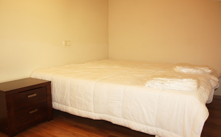 Imagen de la habitación del Hotel Apartamentos La Merceria 3000. Foto 4