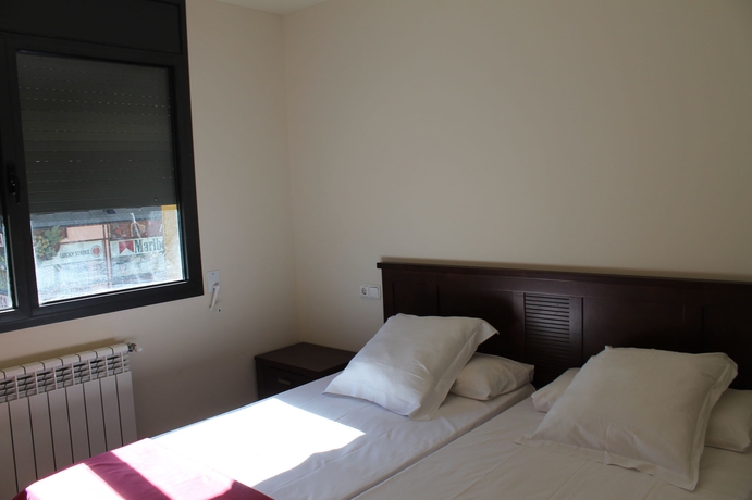 Imagen de la habitación del Hotel Apartamentos La Merceria 3000. Foto 6