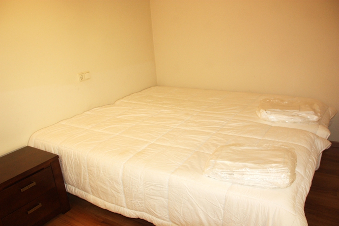 Imagen de la habitación del Hotel Apartamentos La Merceria 3000. Foto 7