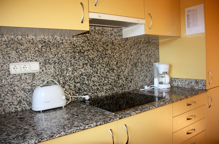 Imagen de la habitación del Hotel Apartamentos La Merceria 3000. Foto 9