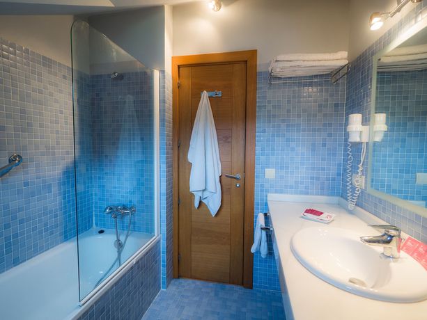 Imagen de la habitación del Hotel Apartamentos Posada La Robla. Foto 9